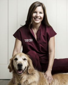Dr. Fishman with dog 